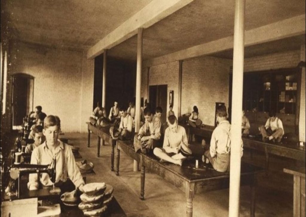 Students at Minnesota State Training School in the workroom